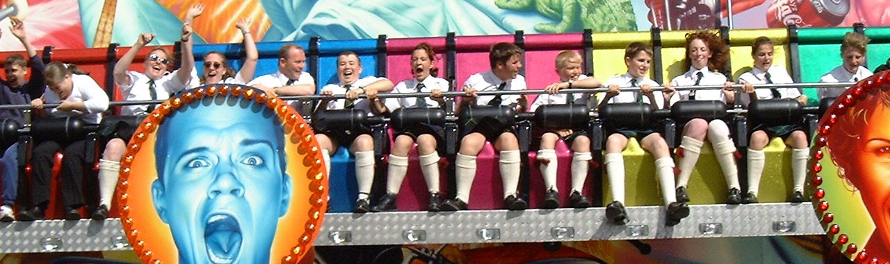 July 2001. Wednesbury Carnival - Things You Shouldn't Do In A Kilt: The Fairground Ride - names show when mouse placed on head